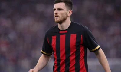 Robertson con la maglia del Milan, immagine creata con l'intelligenza artificiale